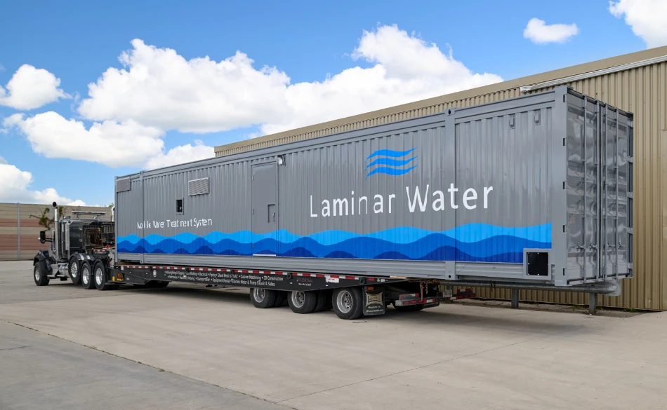Water treatment container on flatbed